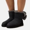 Ugg Mini Bailey Fuzzy Bow - Snowboots- Black 2 Ugg Mini Bailey Fuzzy Bow - Snowboots- Black -Ugg 804d05b53f104d23bfd5d34ac0297970